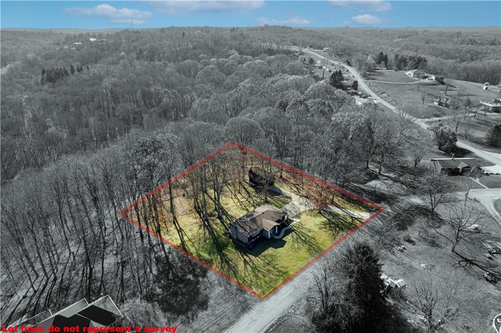 18 Colwell Street Burgettstown, PA 15021 - Photo 36 of 39 an aerial view of a house with a yard