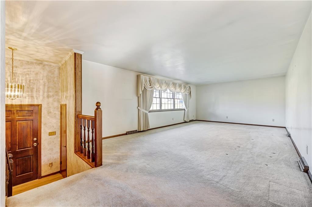18 Colwell Street Burgettstown, PA 15021 - Photo 5 of 39 an empty room with windows
