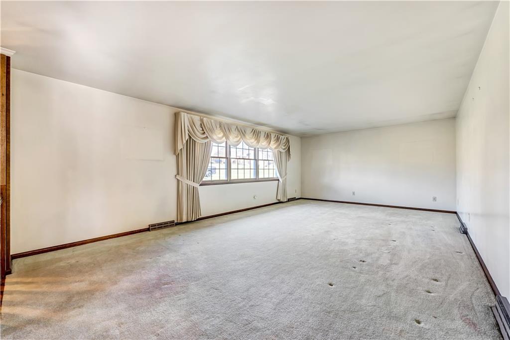 18 Colwell Street Burgettstown, PA 15021 - Photo 6 of 39 an empty room with windows
