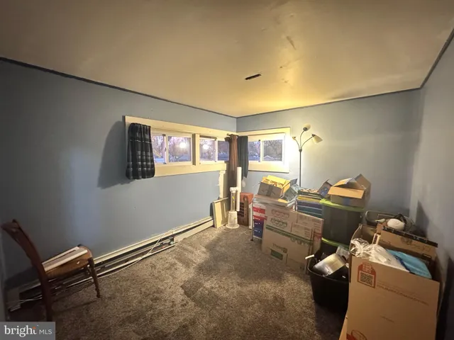 a room with furniture and a window