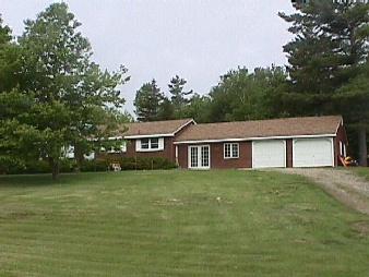 10 S Road Peru, MA 01235 - Photo 1 of 2 a front view of a house with a garden
