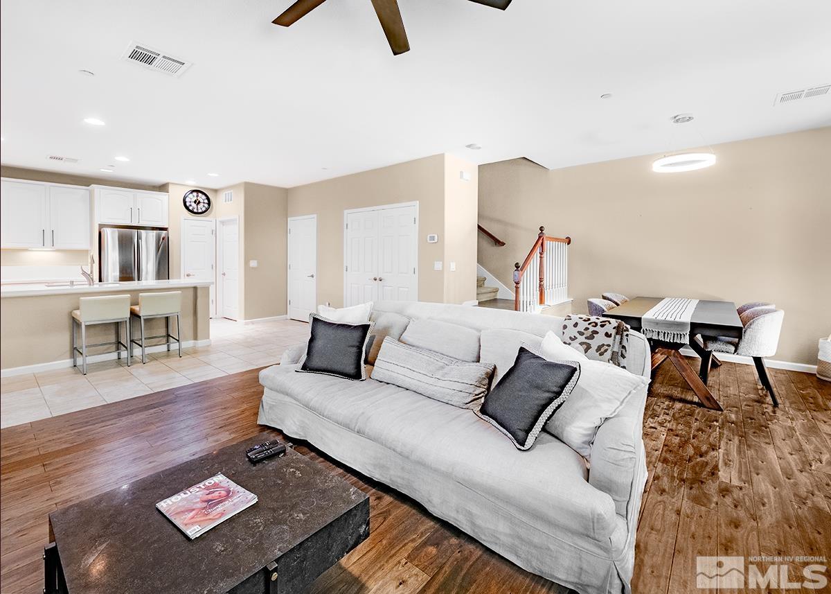 1865 Wind Ranch Road, Unit B Reno, NV 89521 - Photo 9 of 26 a living room with furniture and a rug