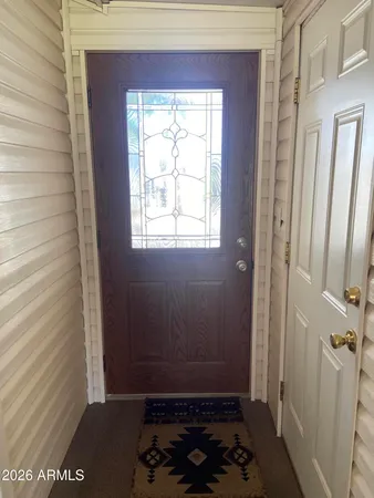 a view of a room that has a window in it