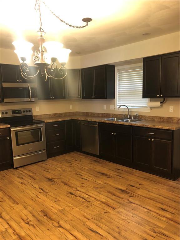 4864 Lucerne Road, Unit 4864 Indiana, PA 15701 - Photo 4 of 18 a kitchen with a sink and a stove