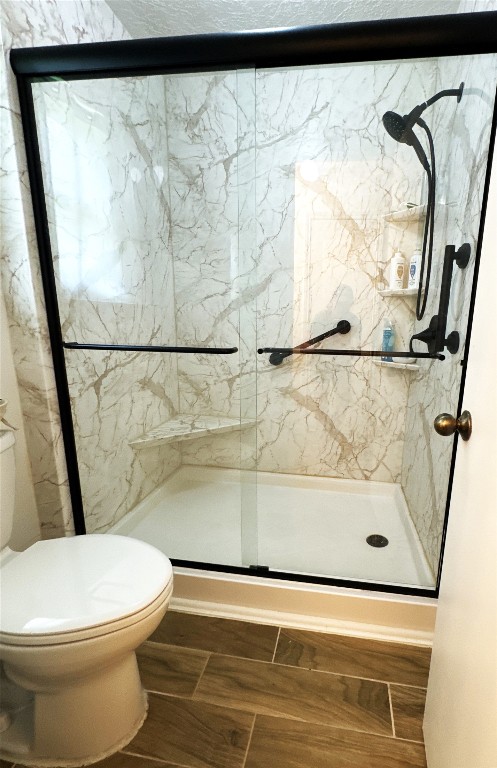 144 Thornton Road Trinity, TX 75862 - Photo 29 of 39 a bathroom with a toilet and a shower