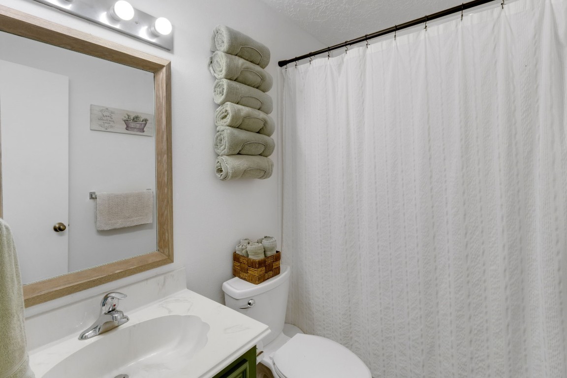 144 Thornton Road Trinity, TX 75862 - Photo 34 of 39 a bathroom with a sink toilet and shower
