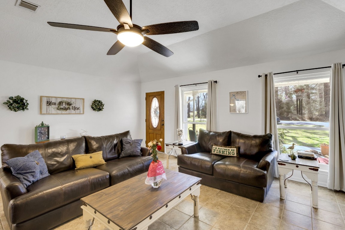 144 Thornton Road Trinity, TX 75862 - Photo 10 of 39 a living room with furniture and a window