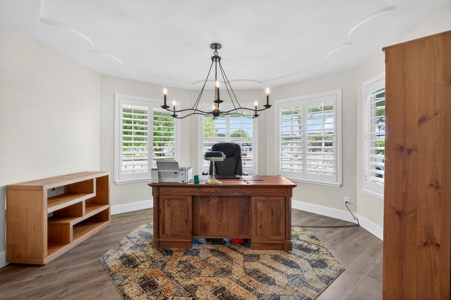2325 Rio Verde Drive Riverbank, CA 95367 - Photo 15 of 43 a view of a workspace with furniture and a window