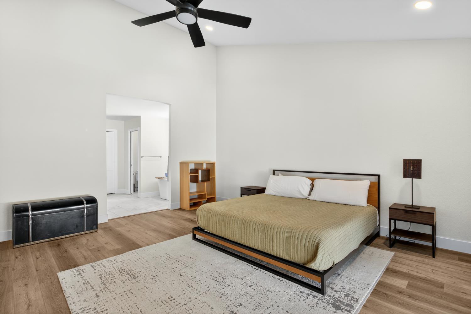 2325 Rio Verde Drive Riverbank, CA 95367 - Photo 27 of 43 a bedroom with a bed a couch and a dresser