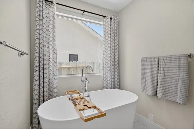 a bathroom with a sink and shower