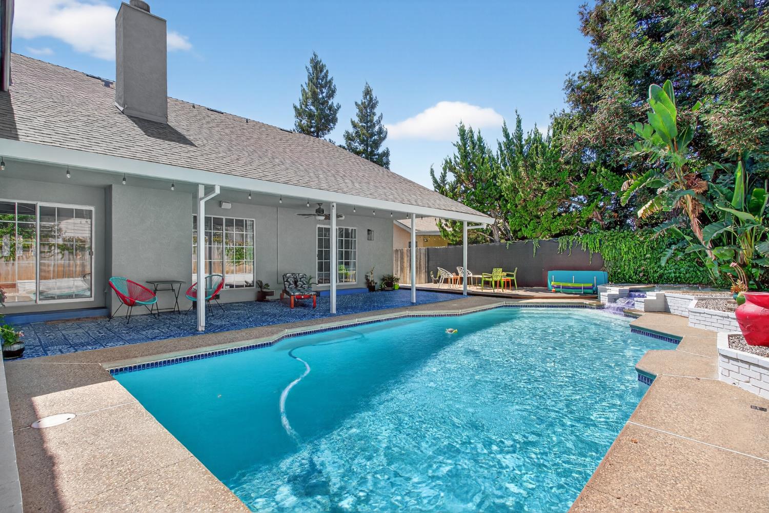 2325 Rio Verde Drive Riverbank, CA 95367 - Photo 37 of 43 a view of a house with backyard porch and sitting area