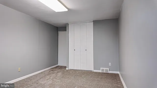 a view of a room with a window