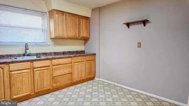 a view of a hallway with a chandelier