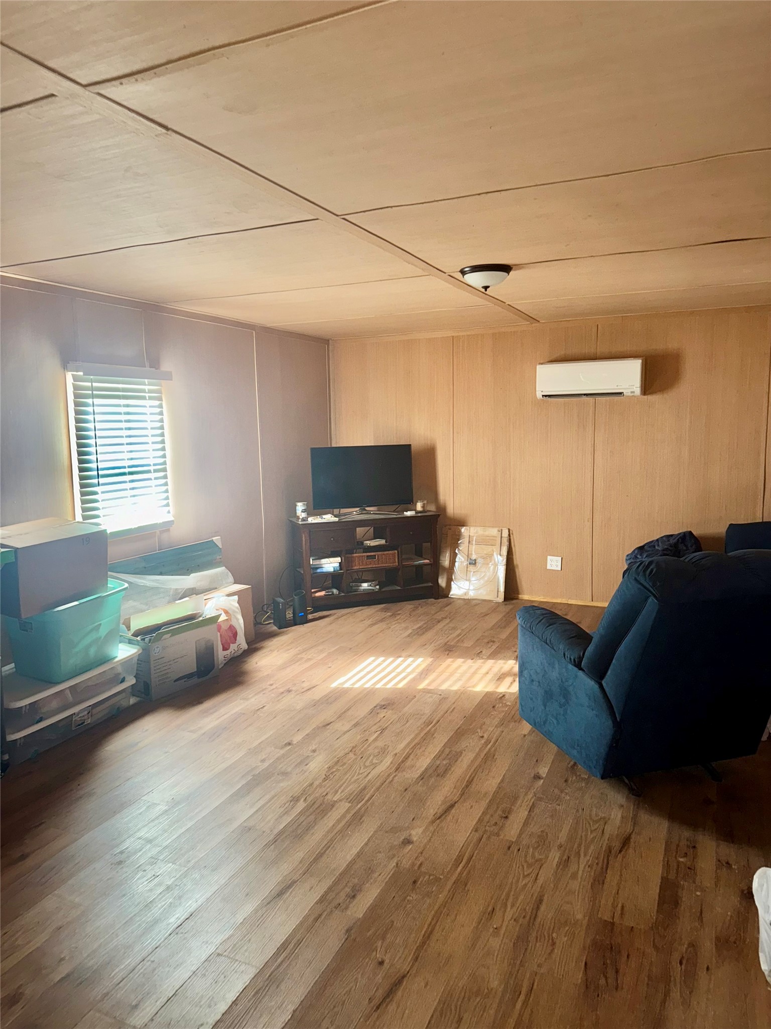 369 East Chestnut Avenue Winnie, TX 77665 - Photo 15 of 20 a bedroom with a bed and a couch