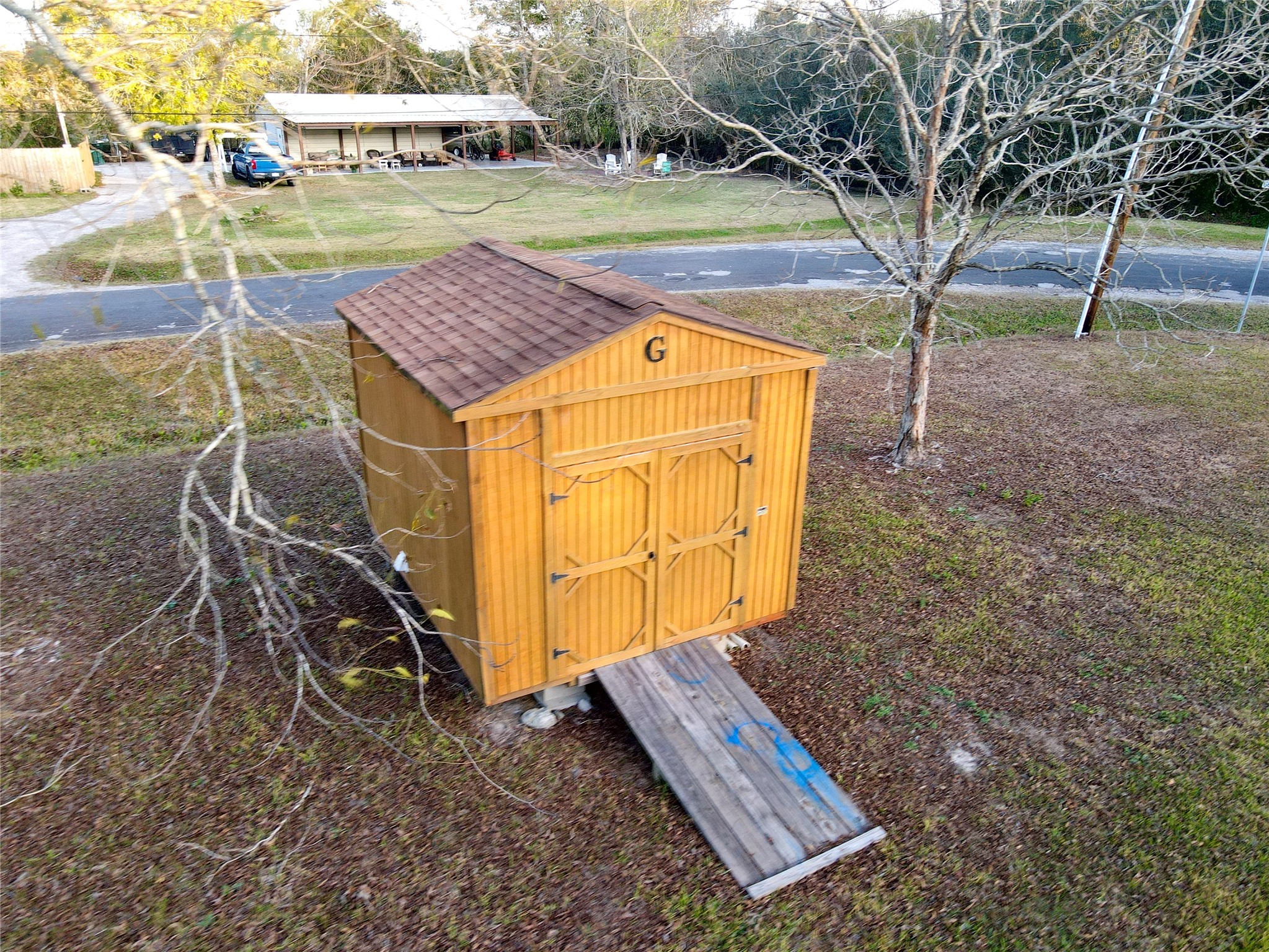 369 East Chestnut Avenue Winnie, TX 77665 - Photo 18 of 20 a view of a yard with an outdoor space