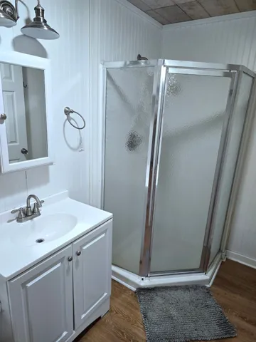 a bathroom with a sink and mirror