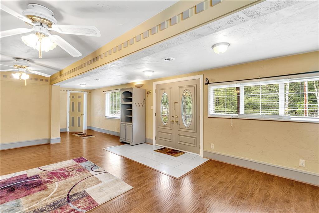 2665 Berlin Farm Road Export, PA 15632 - Photo 11 of 39 a view of an empty room with window and wooden floor