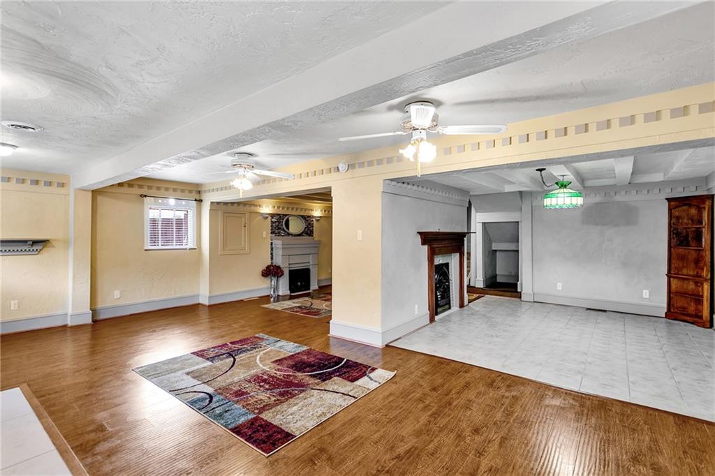 2665 Berlin Farm Road Export, PA 15632 - Photo 13 of 39 a living room with furniture and a fireplace