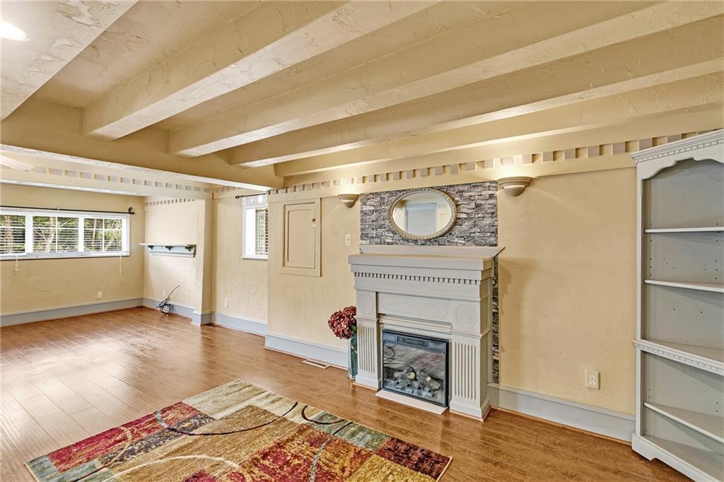 2665 Berlin Farm Road Export, PA 15632 - Photo 18 of 39 a view of a livingroom with wooden floor and a fireplace