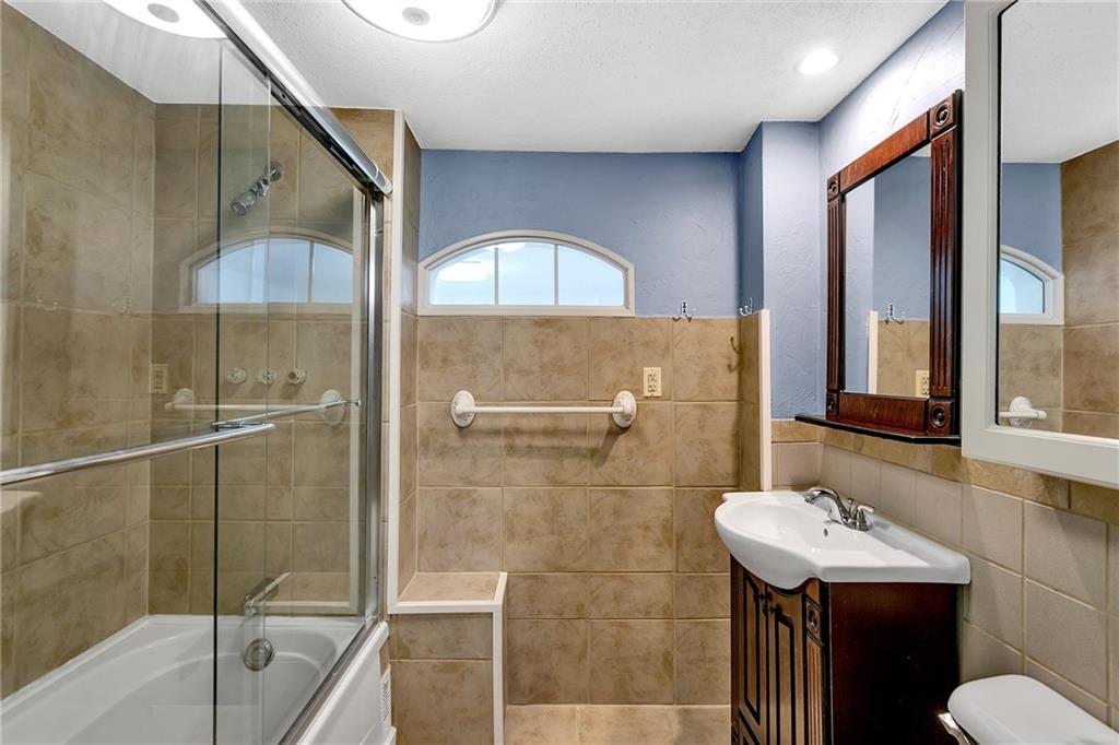 2665 Berlin Farm Road Export, PA 15632 - Photo 25 of 39 a bathroom with a sink a toilet and shower