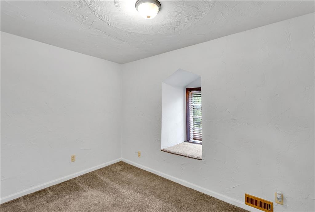 2665 Berlin Farm Road Export, PA 15632 - Photo 31 of 39 an empty room with windows