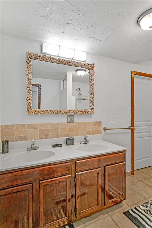 2665 Berlin Farm Road Export, PA 15632 - Photo 37 of 39 a bathroom with a sink and a mirror