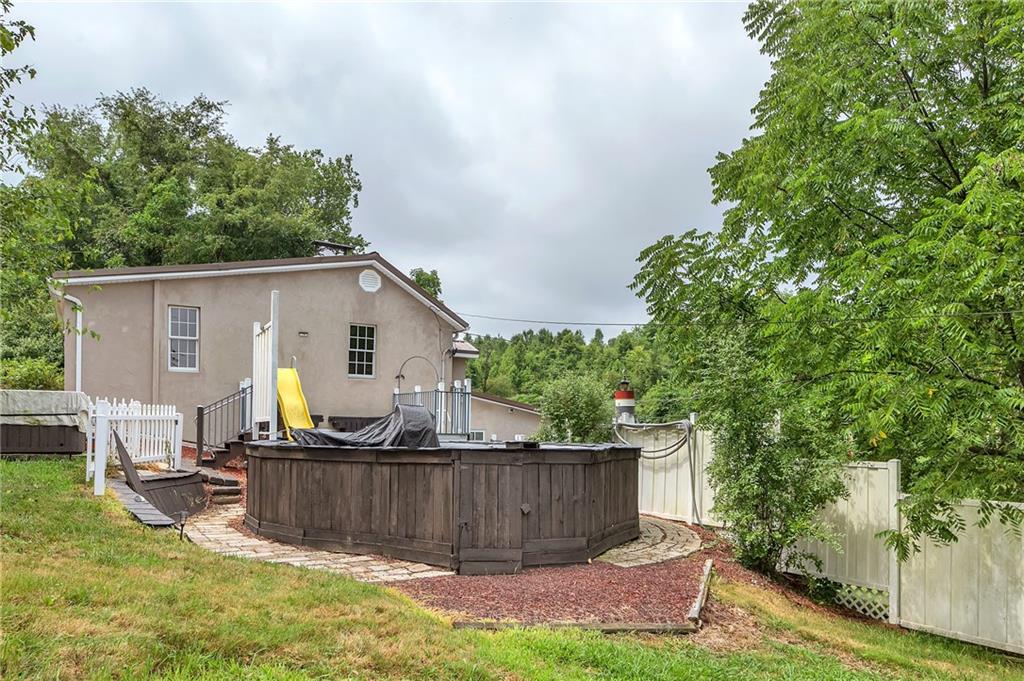 2665 Berlin Farm Road Export, PA 15632 - Photo 8 of 39 a view of a house with backyard and sitting area
