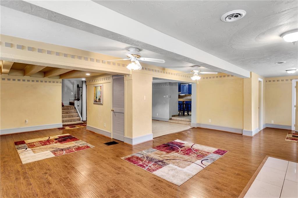 2665 Berlin Farm Road Export, PA 15632 - Photo 10 of 39 a living room with furniture and a rug