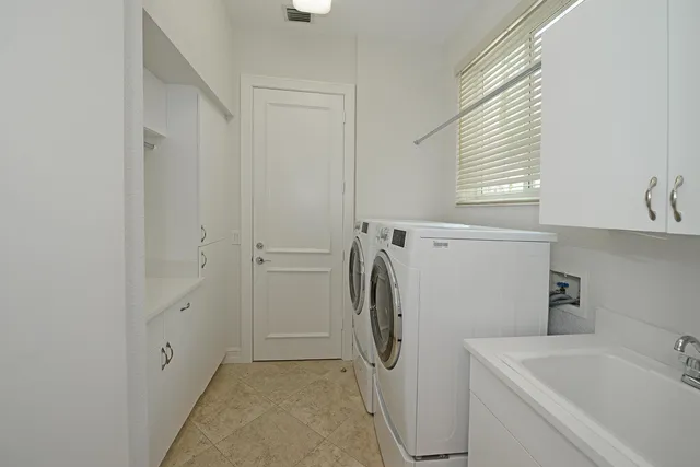 a view of a patio with swimming pool