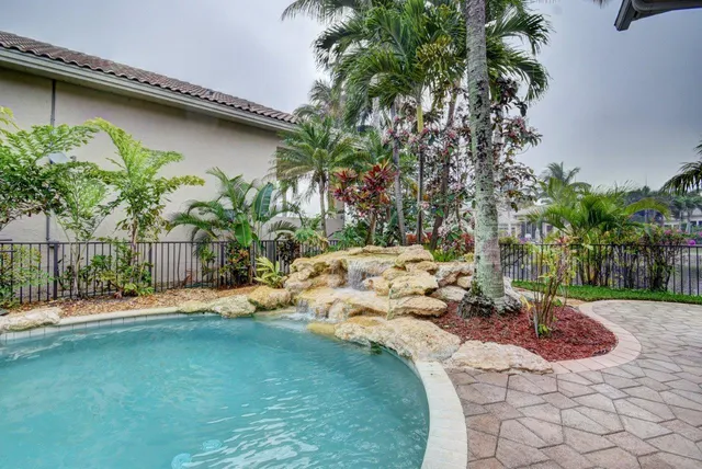 a view of a lake with a yard