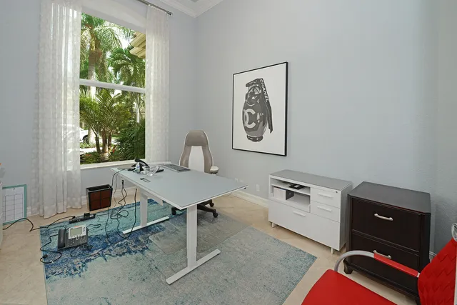 a view of a dining room with furniture window and outside view