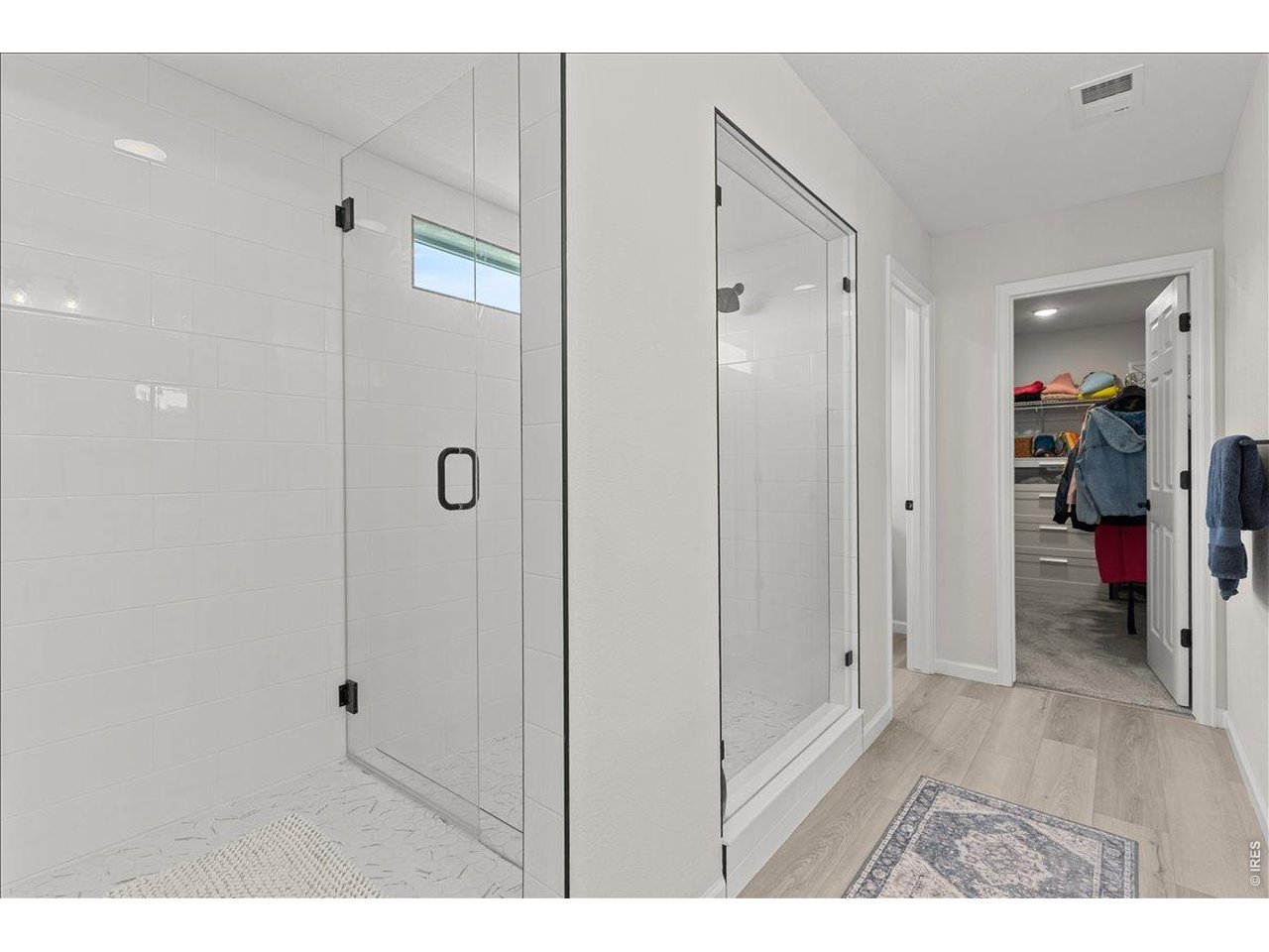 946 Rustling Street Windsor, CO 80550 - Photo 27 of 50 Primary bath w/ large shower and walkin closet
