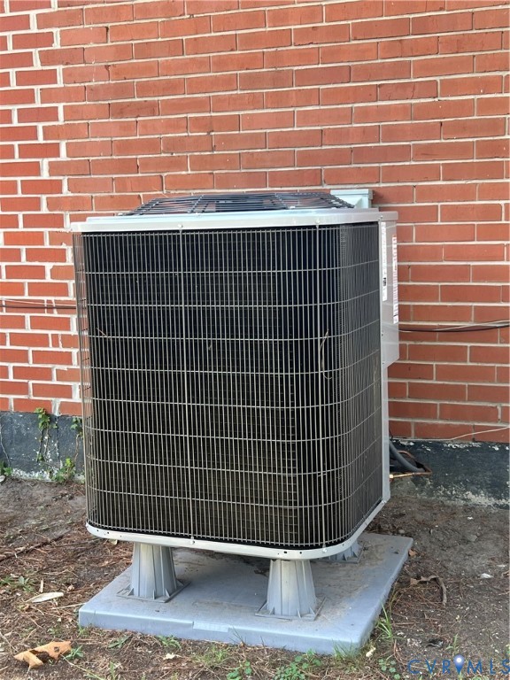 1403 Algona Road Chesapeake, VA 23324 - Photo 37 of 39 Exterior brick wall with a ground-mounted HVAC uni