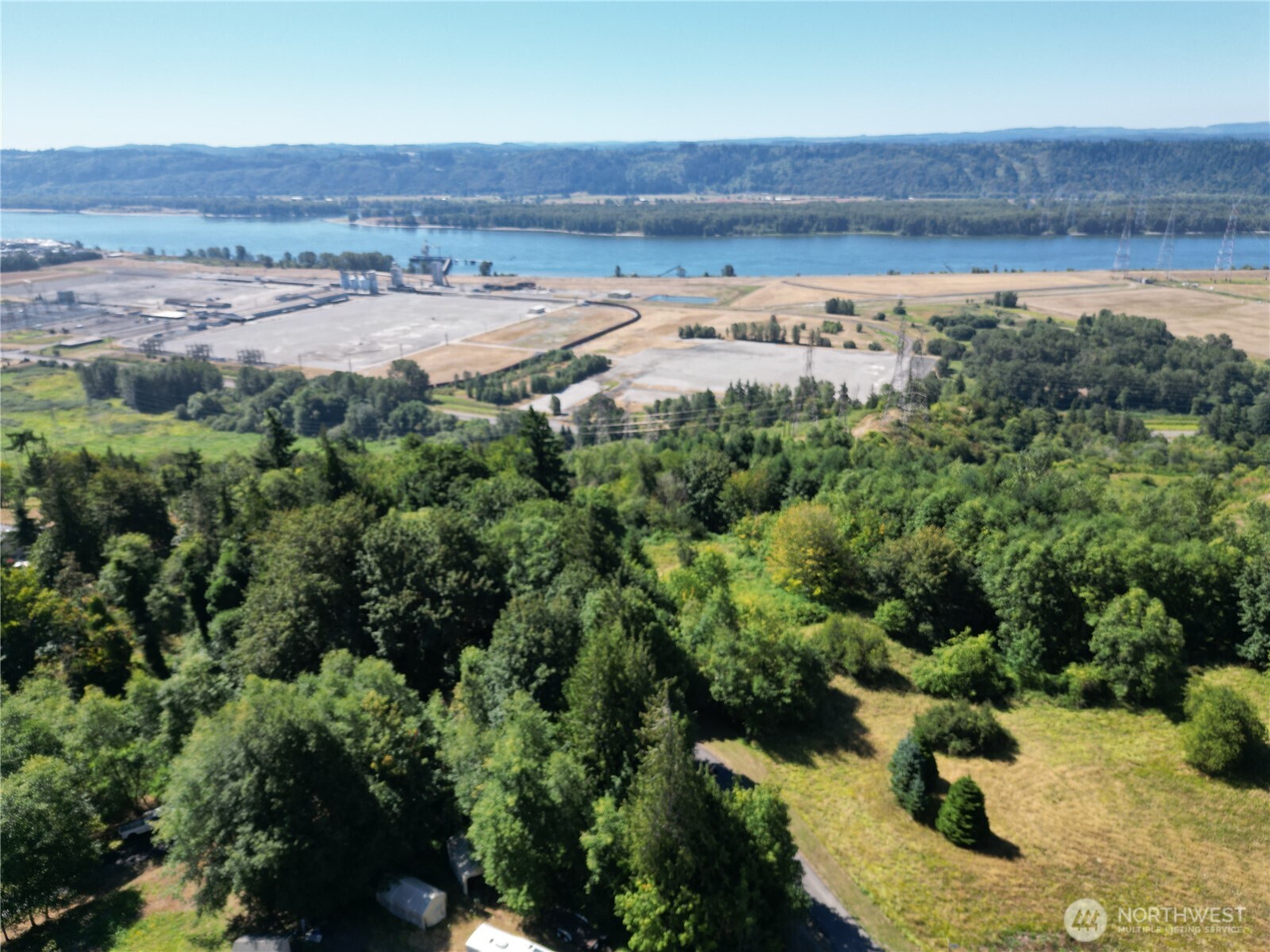106 Bridgeview Lane Longview, WA 98632 - Photo 1 of 11 an aerial view of a houses and a yard