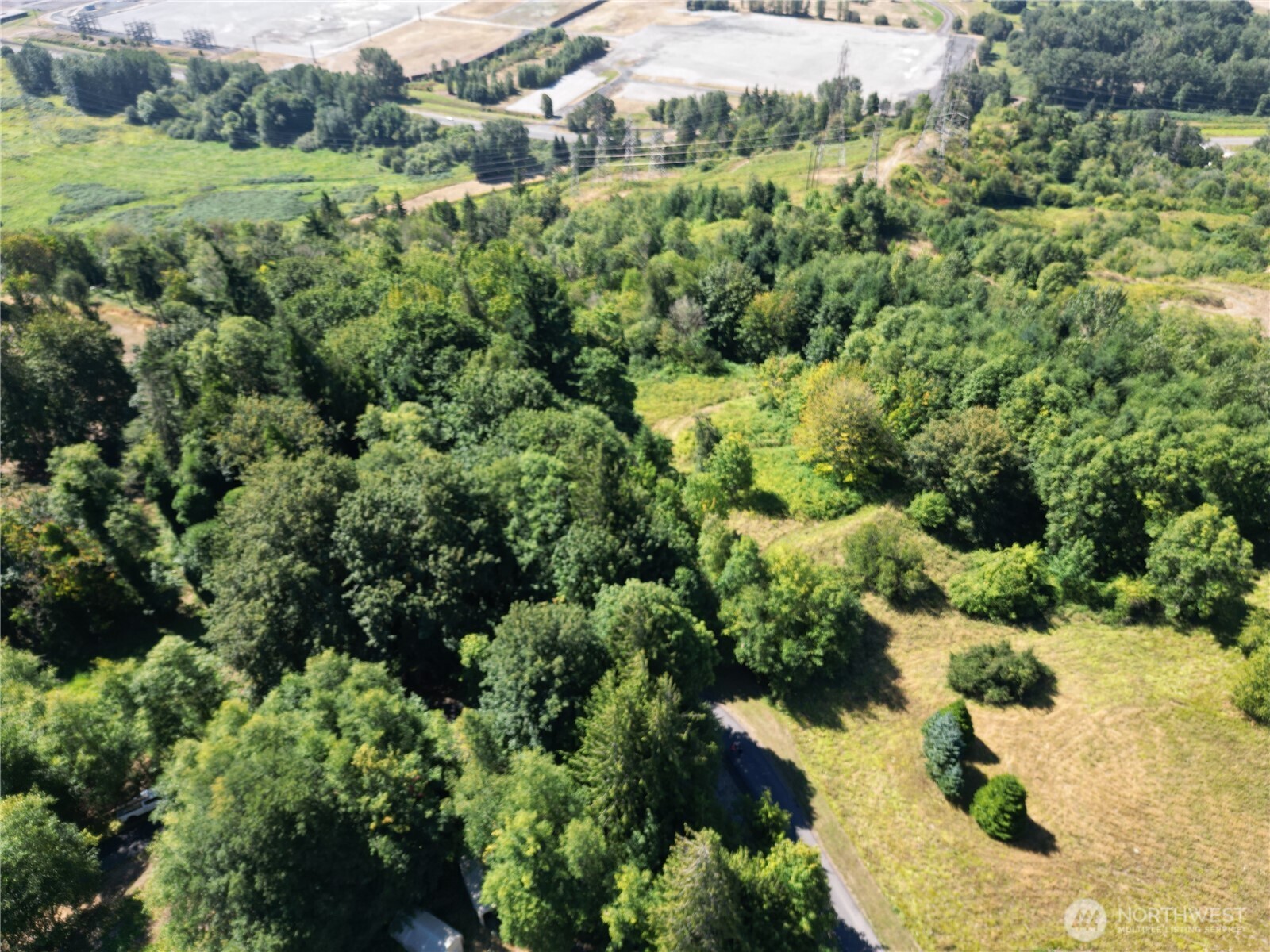 106 Bridgeview Lane Longview, WA 98632 - Photo 3 of 11 an aerial view of a house with a yard