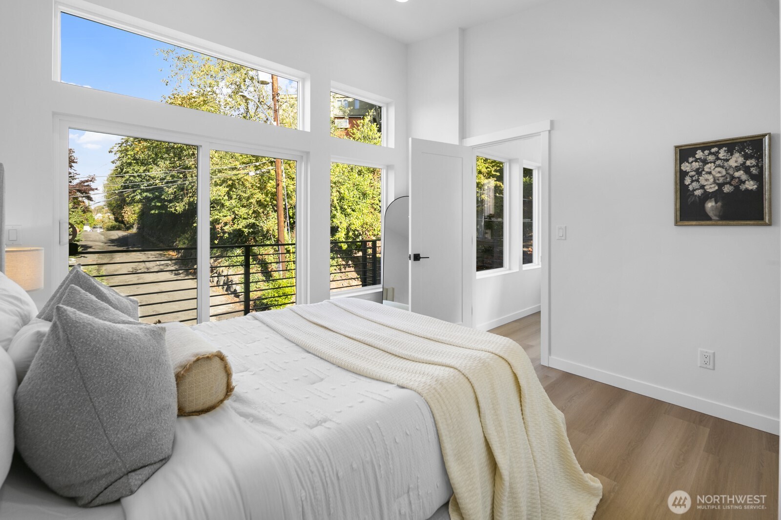 2805 South Grand Street Seattle, WA 98144 - Photo 12 of 31 a bedroom with a bed and a large window