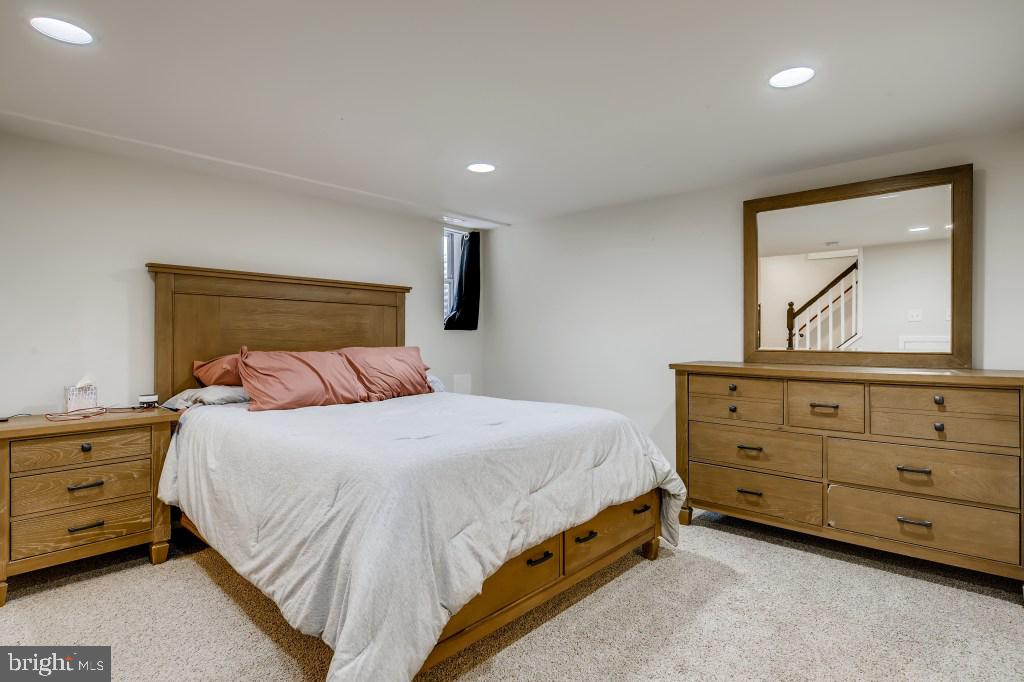 8023 Wallace Road Baltimore, MD 21222 - Photo 13 of 21 a bedroom with a bed and a dresser