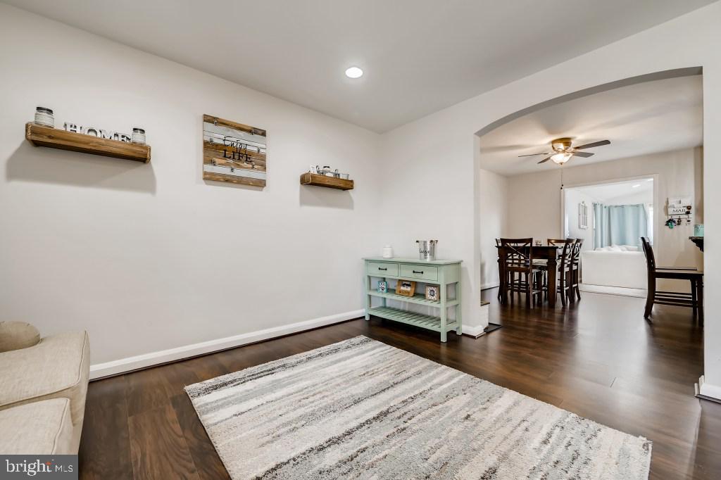 8023 Wallace Road Baltimore, MD 21222 - Photo 21 of 21 a room with furniture and wooden floor