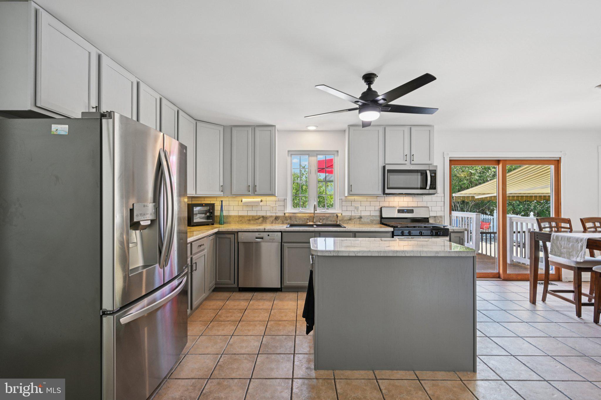 821 West Orvilla Road Hatfield, PA 19440 - Photo 18 of 64 a kitchen with a refrigerator a sink and dishwasher