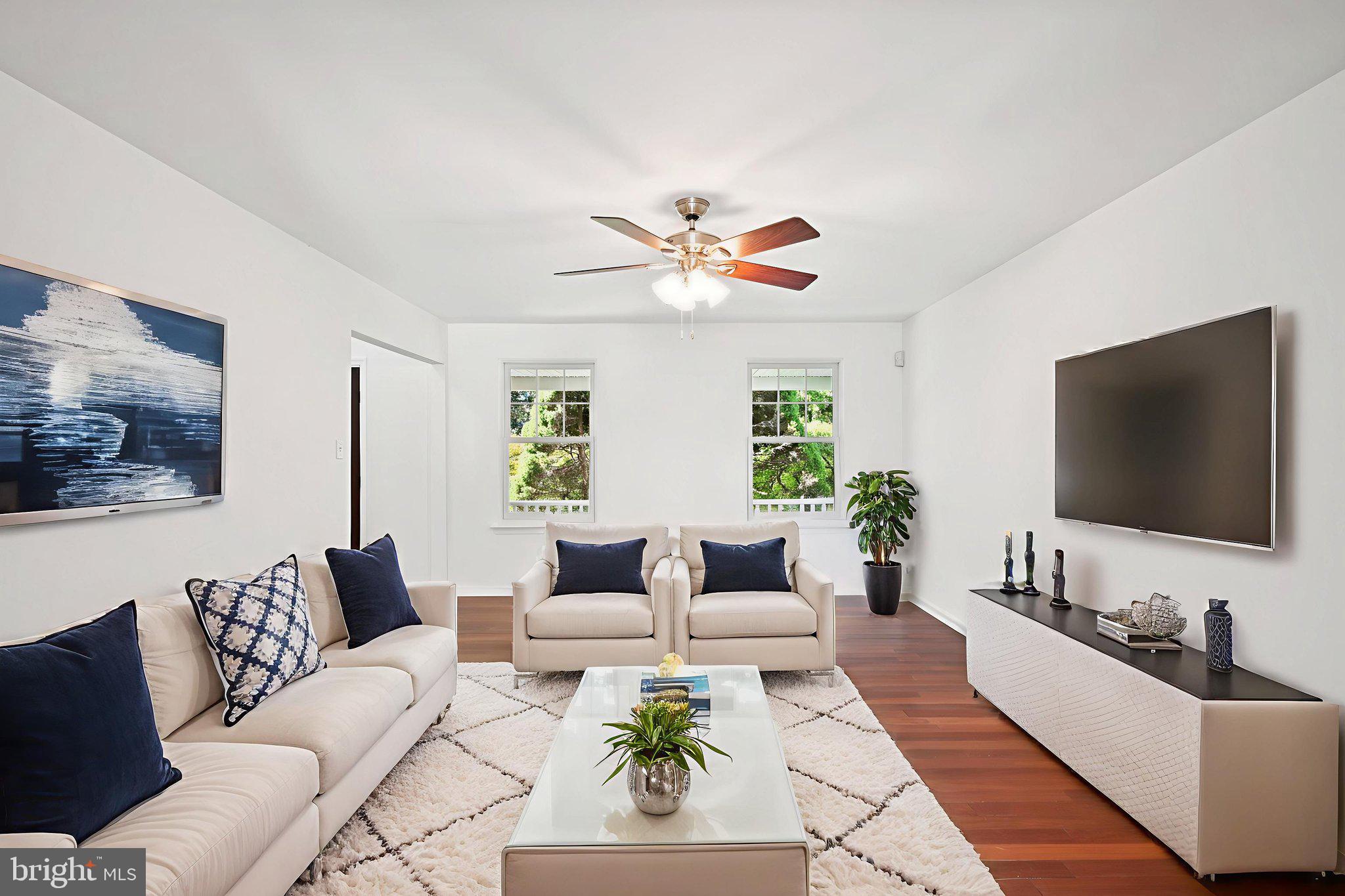 821 West Orvilla Road Hatfield, PA 19440 - Photo 20 of 64 a living room with furniture and a flat screen tv