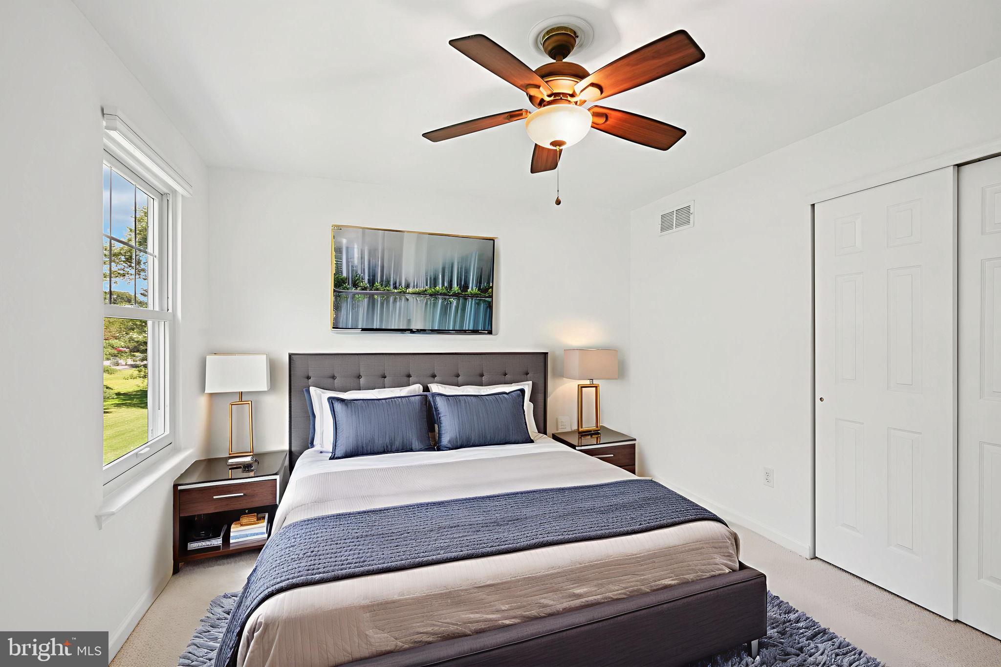 821 West Orvilla Road Hatfield, PA 19440 - Photo 32 of 64 a bedroom with a bed and a chandelier