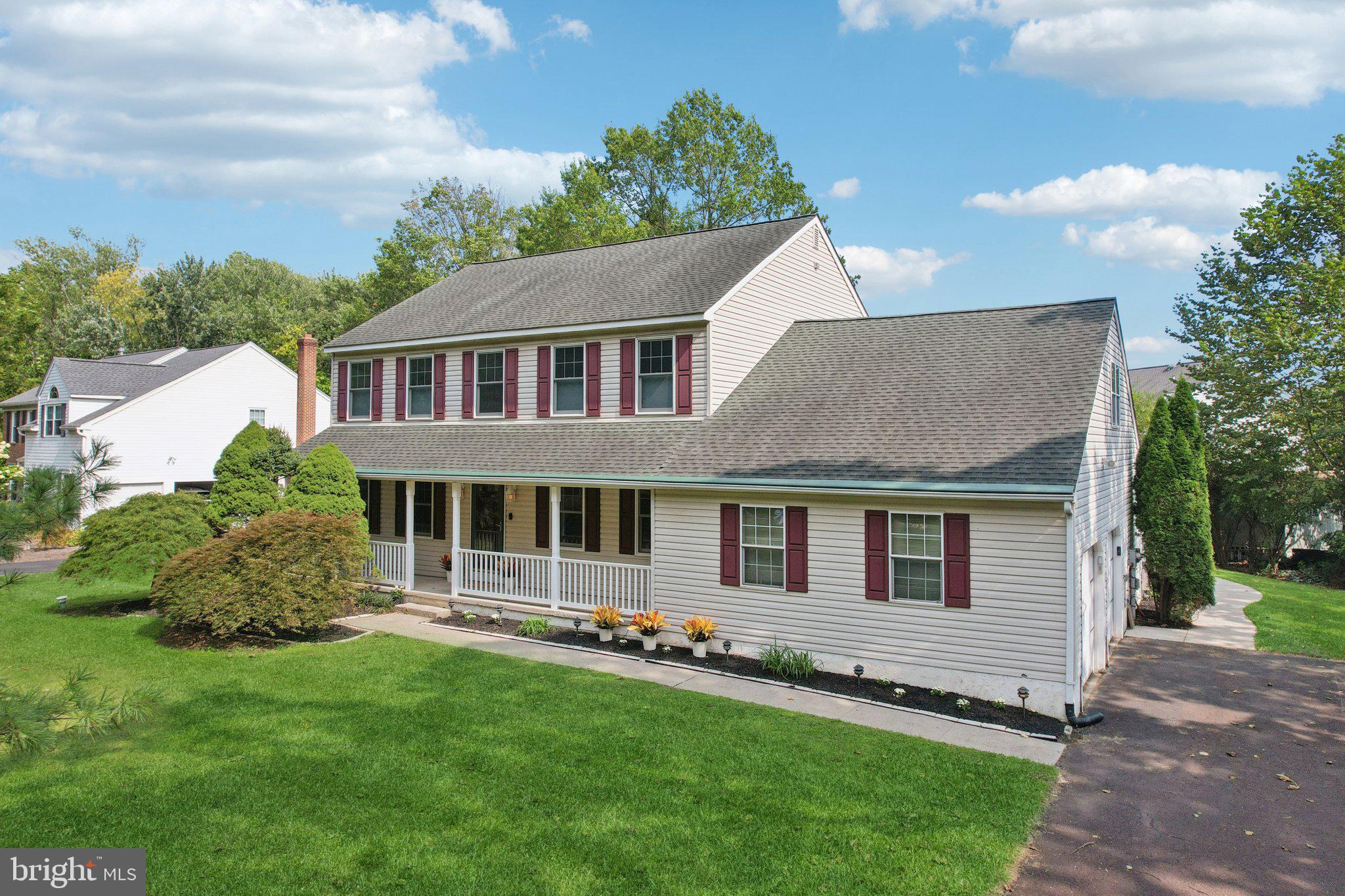 821 West Orvilla Road Hatfield, PA 19440 - Photo 48 of 64 a front view of a house with a yard
