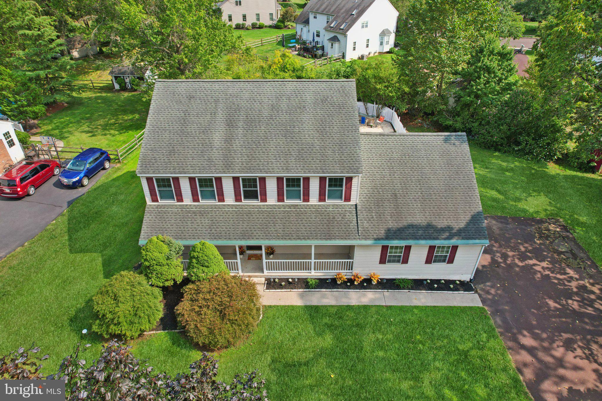 821 West Orvilla Road Hatfield, PA 19440 - Photo 51 of 64 an aerial view of a house with swimming pool and garden
