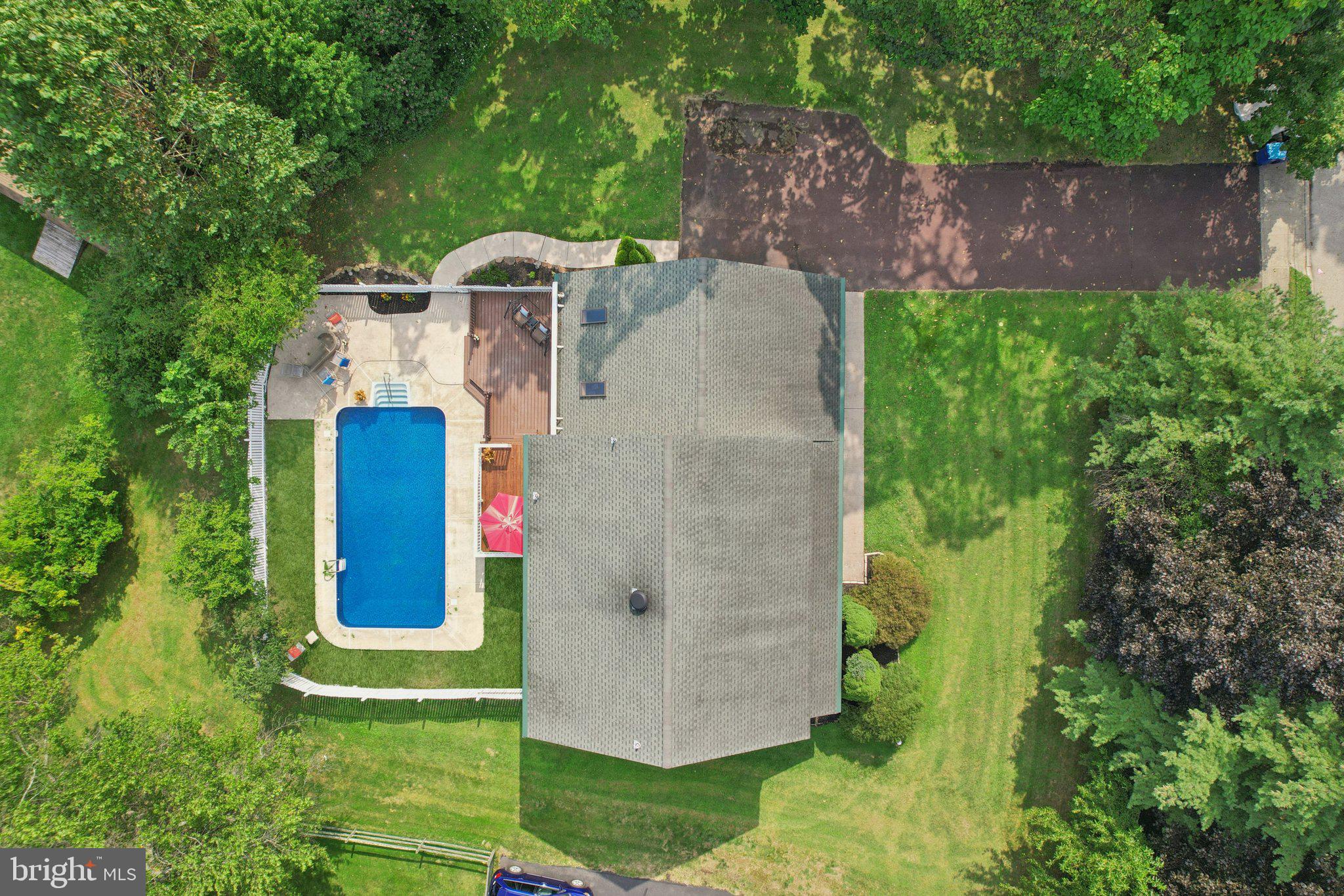 821 West Orvilla Road Hatfield, PA 19440 - Photo 56 of 64 an aerial view of a house with a yard and a large pool