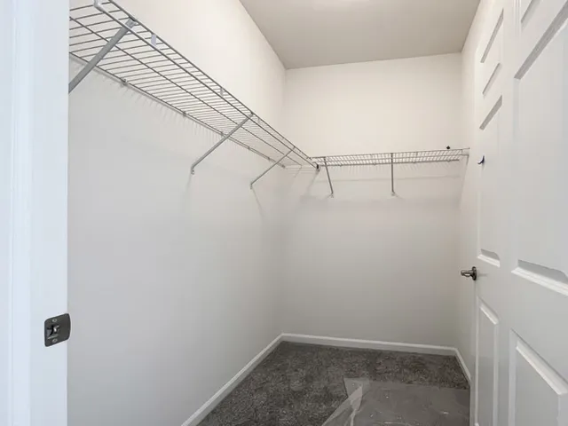 a view of a room with racks on the wall