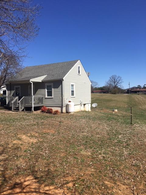 1756 Goodview Road Goodview, VA 24095 - Photo 2 of 10 a view of a house with a yard