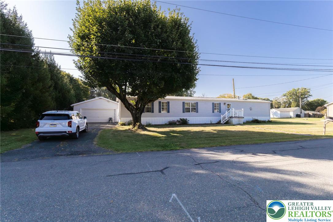 554 Norman Road Nazareth, PA 18064 - Photo 1 of 20 a view of yard with car parked