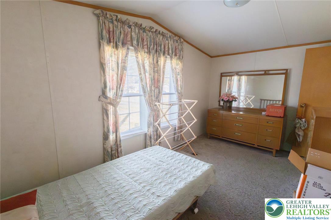 554 Norman Road Nazareth, PA 18064 - Photo 14 of 20 a bedroom with a bed and a window
