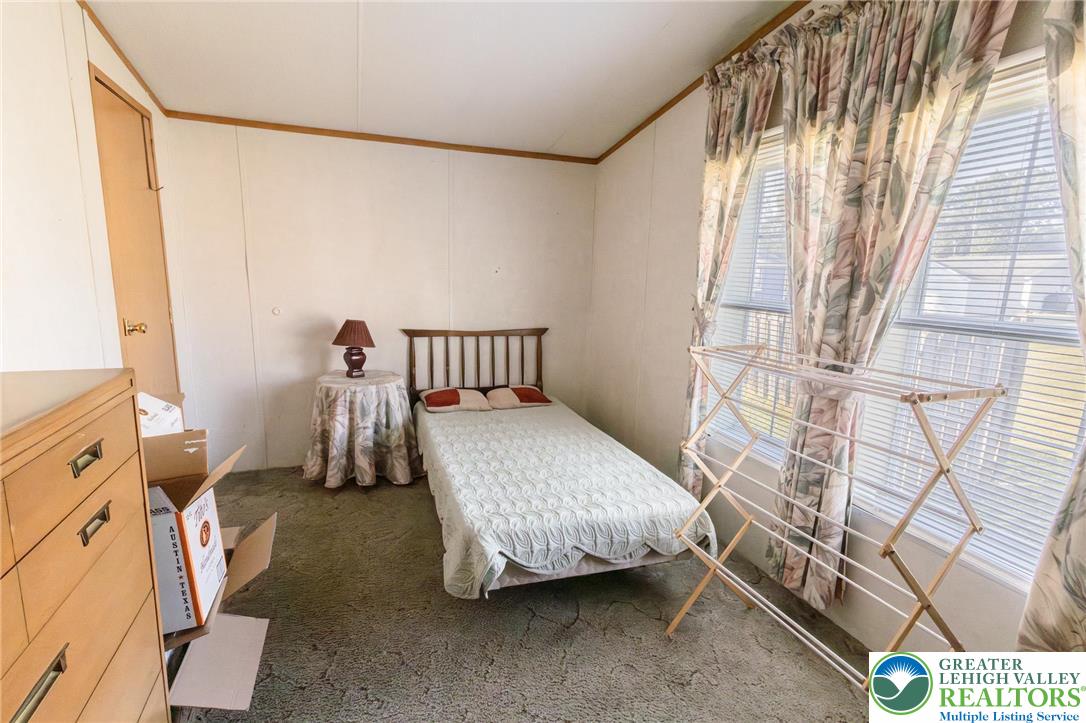 554 Norman Road Nazareth, PA 18064 - Photo 15 of 20 a bedroom with a bed and a window