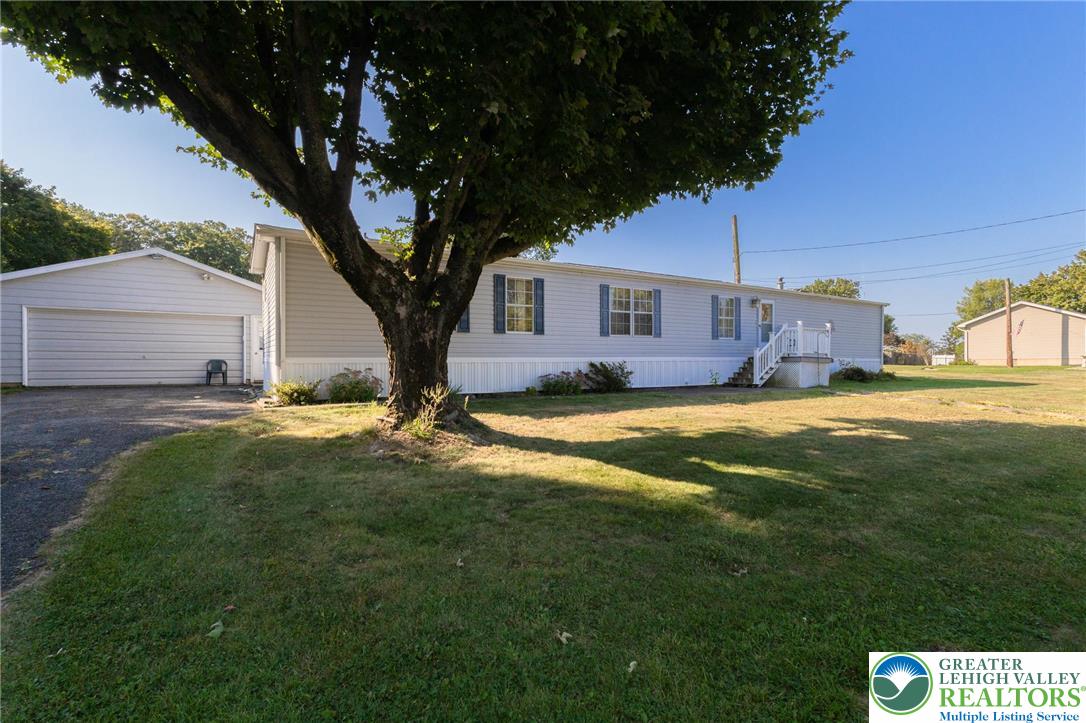554 Norman Road Nazareth, PA 18064 - Photo 2 of 20 a view of yard with swimming pool and green space